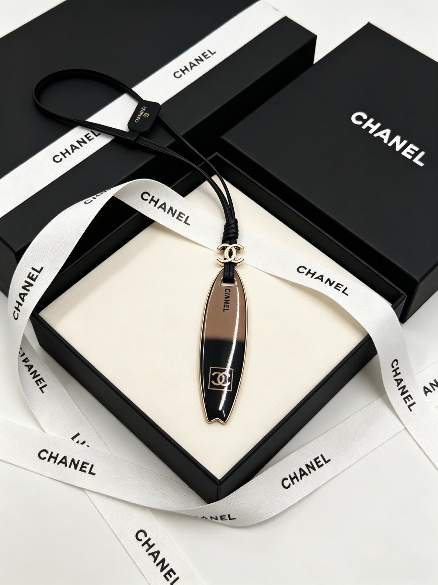 Chanel Surfboard-shaped Leather Cord Charm