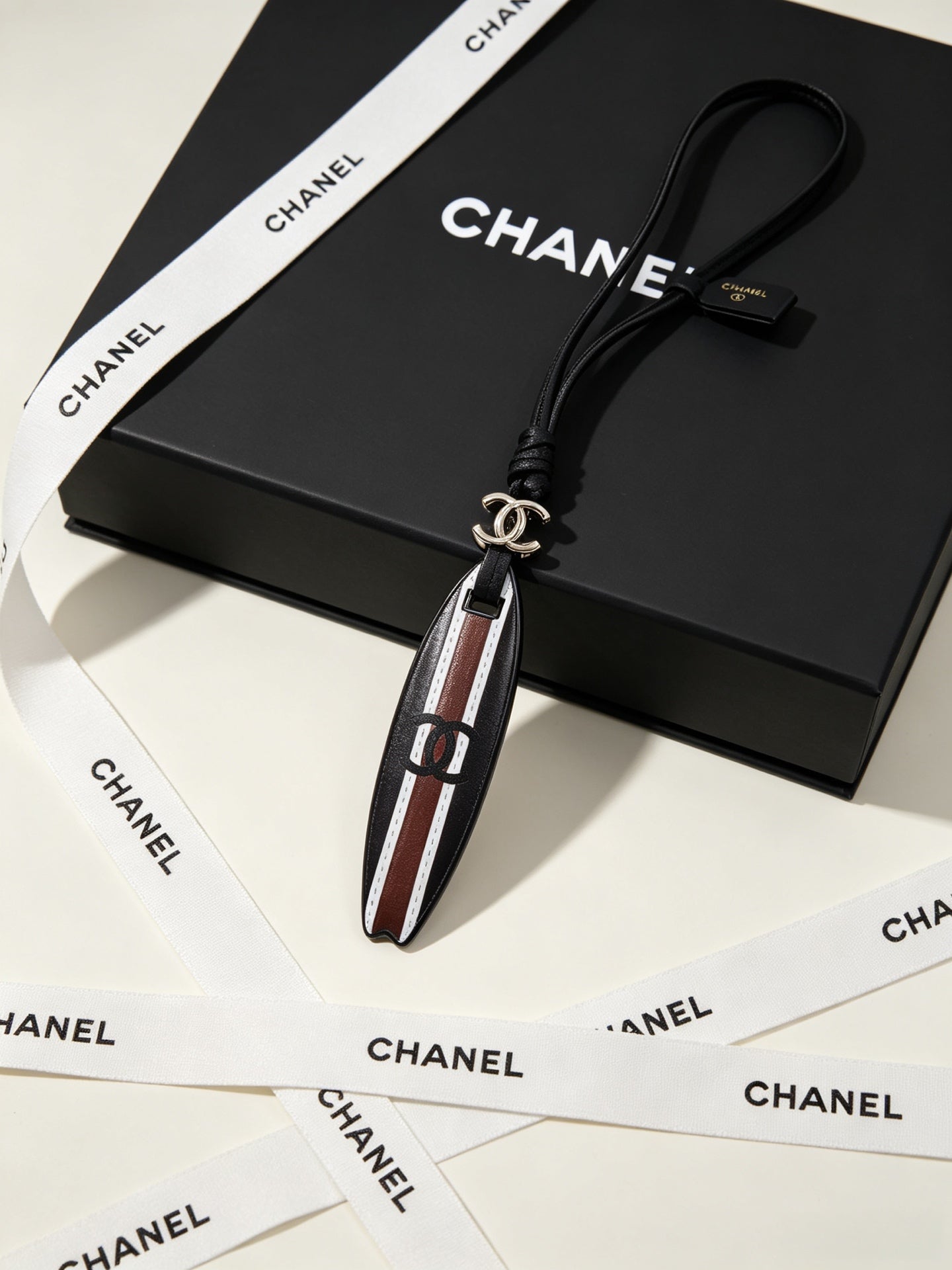 Chanel Surfboard-shaped Leather Cord Charm